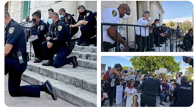 Miami polisi göstericilerle birlikte diz çöktü