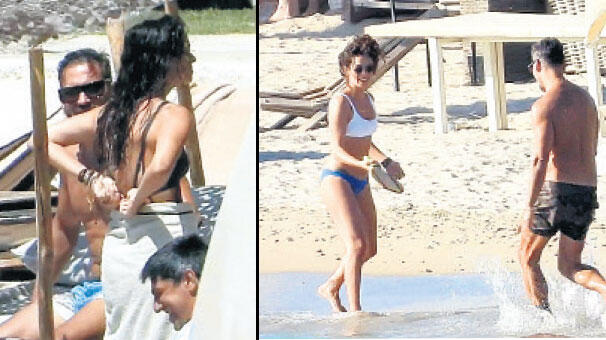Bikinisini  plajda değiştirdi
