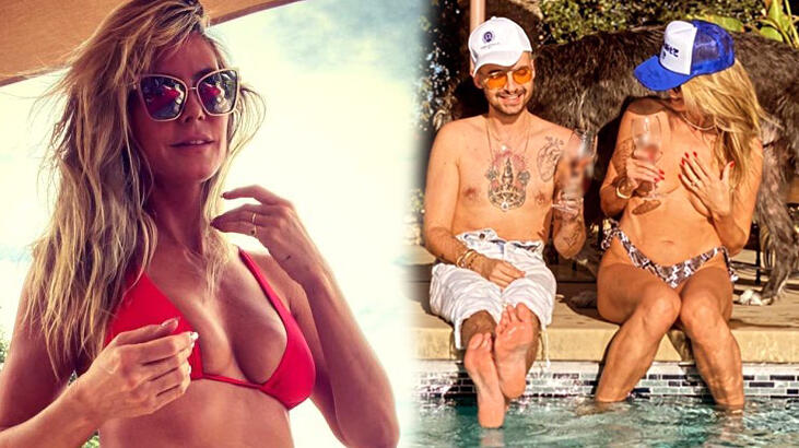 Heidi Klum, havuz başında üstsüz güneşlendi