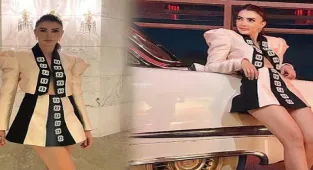 Burcu Özberk'in ödül töreninde giydiği kıyafeti beğeni topladı