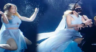 Hadise klibi için elbisesiyle havuza daldı