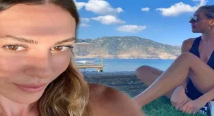 Sinem Kobal'dan çimlerin üzerinde sahil pozu