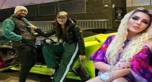 Selin Ciğerci ve Gökhan Çıra lüks arabasıyla poz verdi