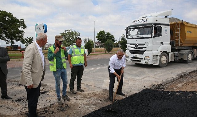 Memduh Büyükkılıç asfalt serdi
