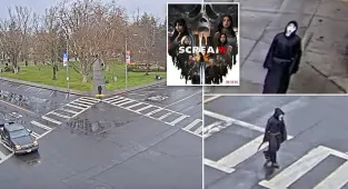 Creepy Ghostface figure stands on street  in publicity stunt