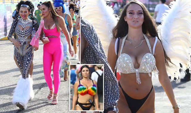 Glammed-up revellers in VERY risque outfits arrive for pride concert