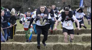 Husbands take part in annual Wife Carrying Race