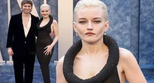 Julia Garner rocks a tire collar at the Vanity Fair Oscars Party