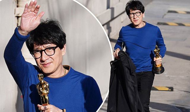 Ke Huy Quan keeps his Oscar close while heading to a studio in LA