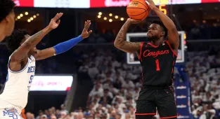 No. 1 seed Houston sinks last-second buzzer beater to defeat Memphis