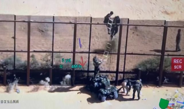 Illegal immigrants swarm border wall, clash with Border Patrol agents ...