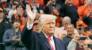 Donald Trump sends wrestling fans wild as he attends college finals