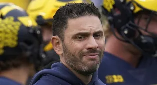 Ex-NFL coach charged with hacking athletes' computers for images