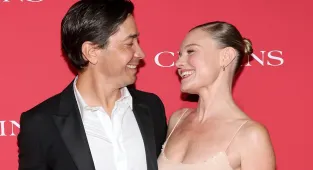 Kate Bosworth's flirty husband Justin Long puts his hand on her butt