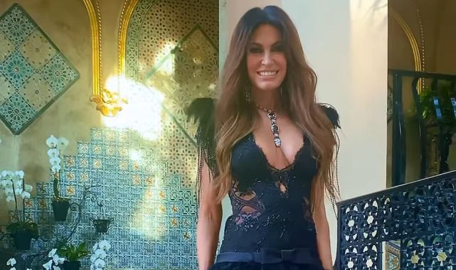 Kimberly Guilfoyle stuns in plunging black dress
