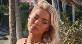Livvy Dunne sets pulses racing in animal-print for SI Swimsuit return