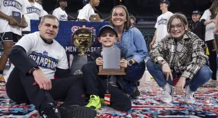 March Madness coach's devastated son, 9, holds back tears after loss
