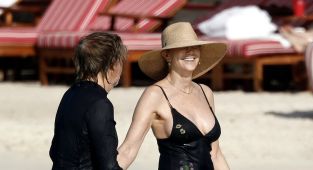 Paul McCartney looks smitten with swimsuit-clad wife Nancy in St Barts