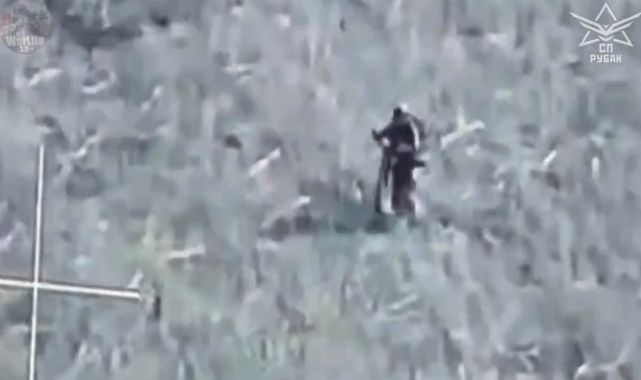 Russian troops ride into frontline on E-SCOOTERS before being droned