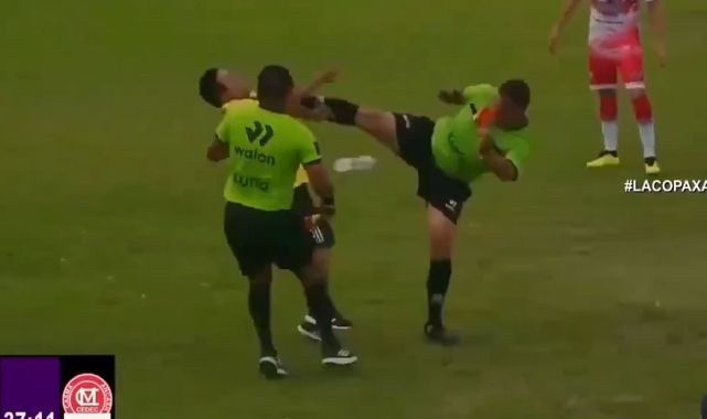 Shocking moment referee KARATE KICKS coaching staff