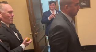 Tom Homan's ice cold reaction as protesters scream in his face