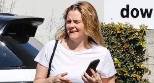 Ugh, as if! Alicia Silverstone looks worlds away from Clueless days