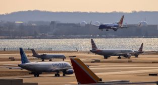American Airlines planes bump wings at Washington airport