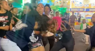 Disturbing moment mass catfight erupts at Texas state fair
