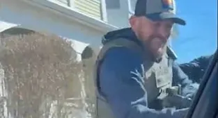 ICE agents smash man's window to arrest him as he cowers inside car