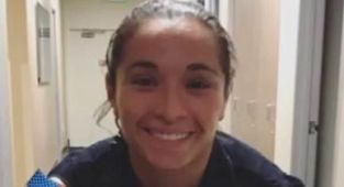 Lesbian cop bullied out of her job by bigoted co-workers gets payout