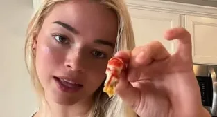 Livvy Dunne's viral crawfish sucking tutorial has the internet talking