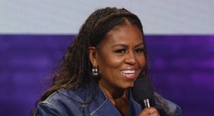 Michelle Obama admits she SPANKED her daughters