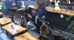 Moment two women viciously pummel waitress simply trying to do her job
