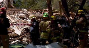 Mystery as house explodes in ritzy Austin neighborhood injuring six