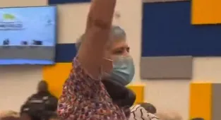 Pro-trans athlete protestor yells 'Hail Satan!' to parents, officials