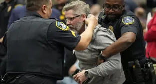 Protestors tasered during Marjorie Taylor Greene's chaotic town hall