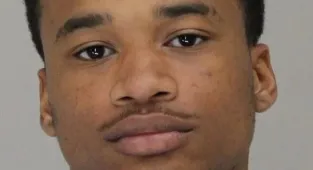 School shooter is seen sneaking through 'unsecured' door