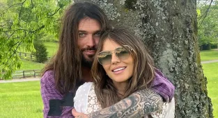 Secret heartache behind Elizabeth Hurley and Billy Ray Cyrus' romance