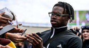 Travis Hunter gets news on dad's drug, gun charges days before draft