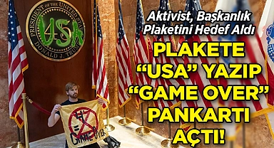 Trump Tower'da İklim Tepkisi: Aktivist, Başkanlık Plaketine "USA" Yazıp "GAME OVER" Pankartı Açtı