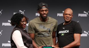 Usain Bolt's dad dead aged 68 as tributes pour in