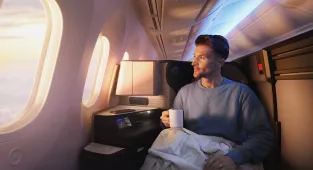 Airline unveils luxury cabins as it cuts summer vacation routes