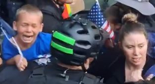 Antifa mob berates a CHILD in shocking footage