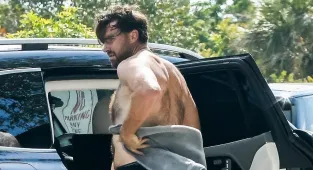 'Taylor is okay with that?': Travis' VERY hairy back leaves fans split