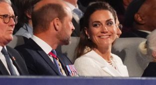 Beaming Kate puts on a loved up display with William at VE Day concert