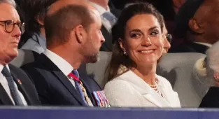 Beaming Kate puts on a loved up display with William at VE Day concert