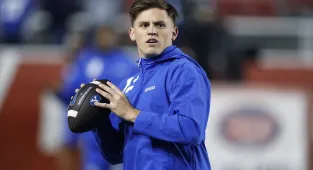 BYU quarterback accused of rape, strangulation and biting in lawsuit