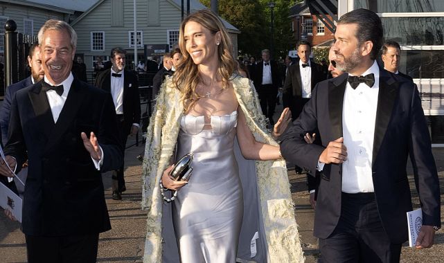 Donald Trump Junior rubs shoulders with Nigel Farage at black tie-do