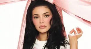 Kylie Jenner in push-up bra and thigh-high stockings in raciest shoot