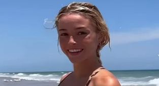 Livvy Dunne stuns in leopard print bikini on vacation with her sister
